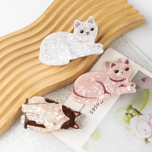 Set of three cute cat-shaped acetate hair claws in white, pink, and calico patterns