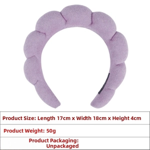 Macro detail of purple quilted sponge headband showing 17cm x 18cm x 4cm dimensions