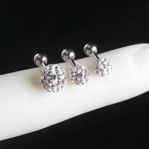 Three sizes of titanium steel labret studs with pave-set white opal crystal balls