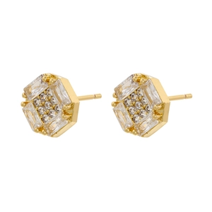 Macro view of gold plated hexagonal studs with inlaid baguette and round clear crystals
