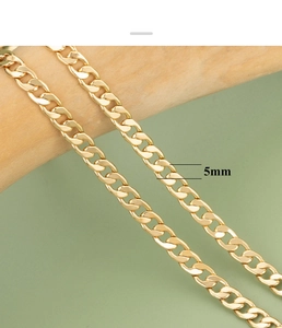 Macro detail of 5mm 18K gold plated O-shaped DIY chain link for jewelry making