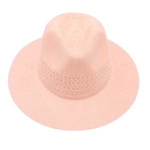 Detail of the pink Panama hat showing the breathable open-work woven band and texture