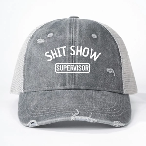 Detailed view of gray distressed trucker hat with SHIT SHOW SUPERVISOR print and mesh back