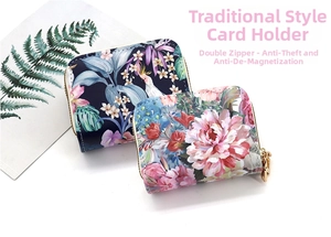 Close-up of double zipper card holder with Chinese floral art and RFID blocking feature