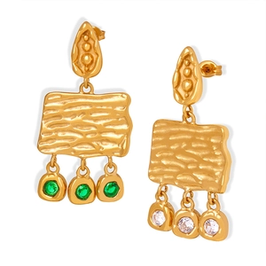 Baroque style gold plated earrings with hammered texture and green zircon drop pendants