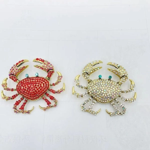 Golden crab brooches set with sparkling red and crystal rhinestones for animal jewelry