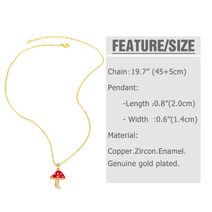 Detailed view of gold-plated mushroom pendant with red enamel and zircon stones
