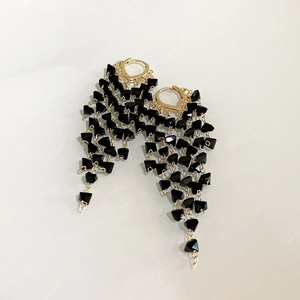 Gothic gold hoop earrings with cascading black crystal tassel fringe for women