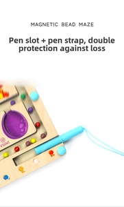 Detail of wooden magnetic bead maze with blue pen, tethered cord and storage slot