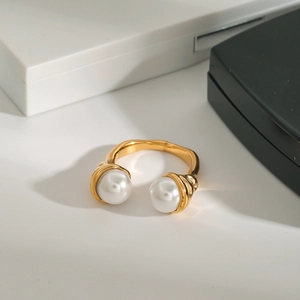 Polished 18k gold plated stainless steel open ring with dual white round shell pearls