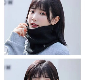 Close-up of a black knitted winter neck gaiter with plush lining worn by a model