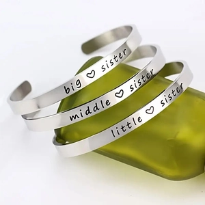 Three-piece stainless steel sister cuff bracelets with engraved heart sisterhood lettering