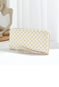 Detailed view of white floral wallet with golden zipper and matching wrist strap
