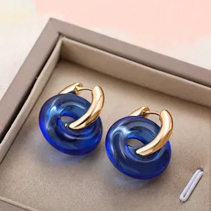 French minimalist gold earrings with deep blue transparent resin rings for women