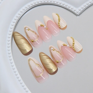 French gradient press-on nails with 3D gold ripple, pearls and 10pcs long pointed shape