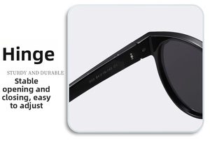 Close-up of durable metal hinge on black polarized sunglasses with model specs