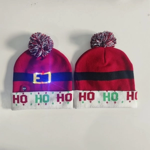 Detail of LED Christmas knit hat with HO HO HO text and colorful glowing lights