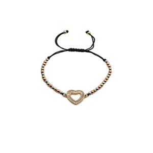 Adjustable heart charm cord bracelet with sparkling cubic zirconia in gold and silver