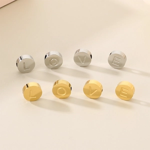 Flat round stainless steel alphabet beads in gold and silver finish for DIY jewelry