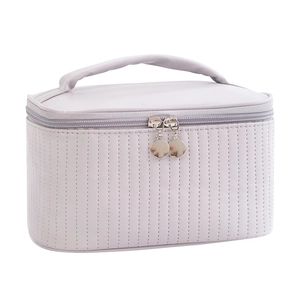 Portable light purple quilted leather makeup bag with double handles and dual zippers