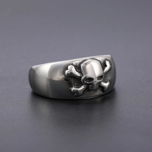 Gothic skull and crossbones stainless steel ring for men with vintage punk pirate aesthetic