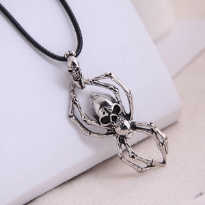 Retro silver metal spider skull pendant on a black braided cord necklace for men