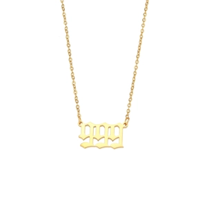 Detailed view of gold stainless steel necklace with gothic 999 number pendant design
