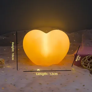 Detail showing dimensions of heart-shaped LED night light at 12cm length and 10cm height