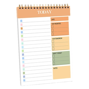 Minimalist spiral daily planner notebook with orange header for time management tasks