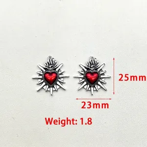 Vintage enamel sacred heart pendants with flame and thorn details 25mm x 23mm