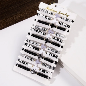 Bohemian colorful heishi bead bracelet set with cross charms displayed on card
