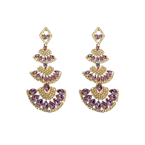 Vintage gold fan-shaped drop earrings with purple crystals and sparkling rhinestones