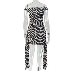 Detail of leopard print mini dress with side ribbon and sleeveless diagonal neckline