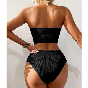 Back view of black waffle texture bikini featuring bandeau top and high-waisted bottoms