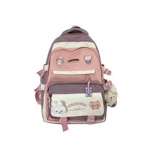 Pink and purple contrast student backpack with cartoon badges and plush bear ornament