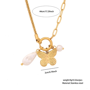 Detail view of gold stainless steel necklace with butterfly and pearl pendants, sizing info