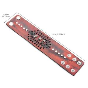 Men's punk wide leather bracelet with metal skulls and woven details in red brown finish