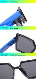 Detail display of kids sunglasses hinge and nose pads in blue and black contrast colors