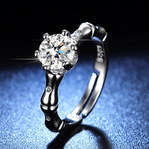 Macro side view of S925 silver bamboo design ring with a large round solitaire diamond
