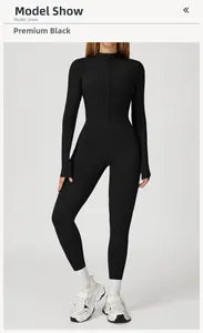 Premium black thermal yoga bodysuit featuring half-zip high collar and thumbhole cuffs