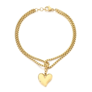 Double-layered gold heart pendant bracelet with snake and box chain on white background