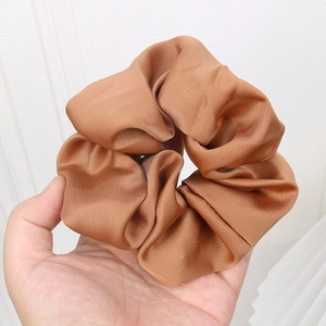 Brown satin silk scrunchie for women with high-shine fabric finish for elegant hair styling