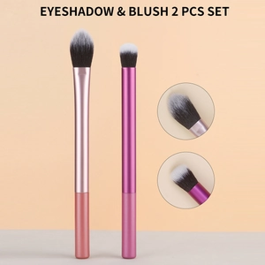 Detailed view of 2-piece makeup brush set including an eyeshadow and a blush brush