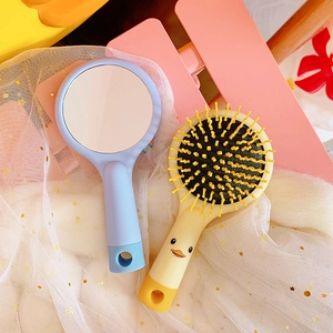 Set spazzola per capelli a anatra gialla e specchio a mano blu per bambini e studenti
