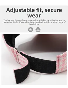 Détail macro du chapeau pied-de-poule rose avec bande velcro ajustable pour un maintien sûr