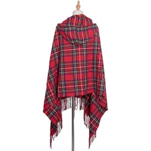 Rear view of red tartan hooded poncho featuring classic fringe detail and plaid pattern