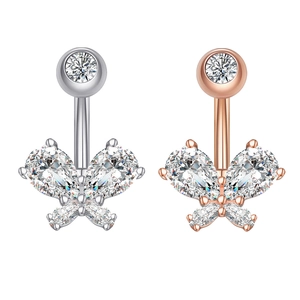 Detail of butterfly navel rings with pear-cut cubic zirconia in silver and rose gold
