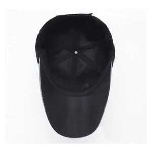 Internal structure of black fishing hat featuring 6-panel design and reflective safety brim