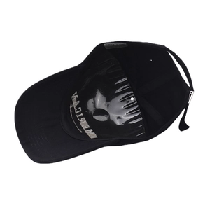 Detail of black cotton baseball cap showing internal structure and American embroidery