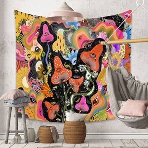 Detail of bohemian mushroom tapestry with psychedelic patterns in a cozy room setting